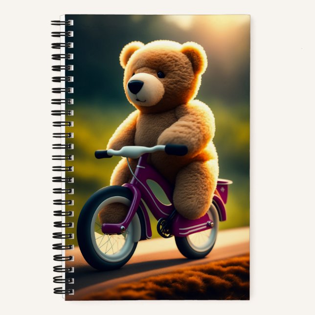 A teddy bear riding a bicycle Notebook (Front)