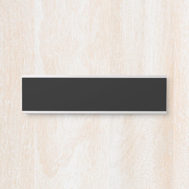 A textured black surface with subtle grain pattern door sign (Front)