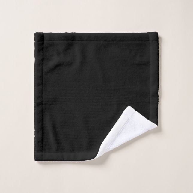 A textured black surface with subtle grain pattern wash cloth (Wash Cloth)