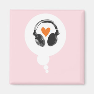 A thought bubble with a heart and headphones magnet