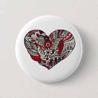 A touch of red 6 cm round badge