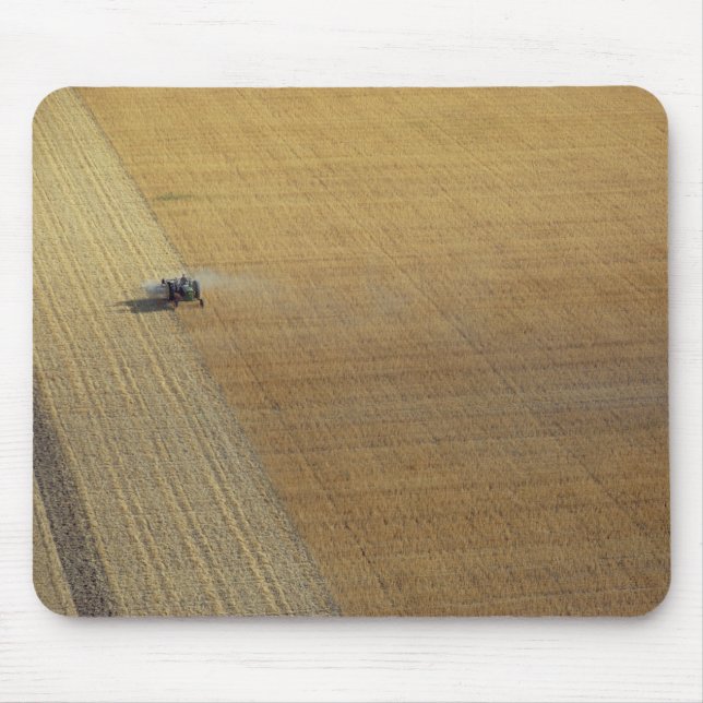 A tractor harvesting mouse mat (Front)