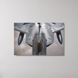 A US Air Force F-22 Raptor is refueled Canvas Print