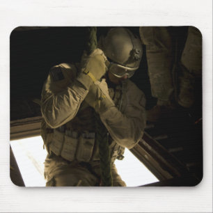 A US Air Force pararescueman begins his descent Mouse Mat
