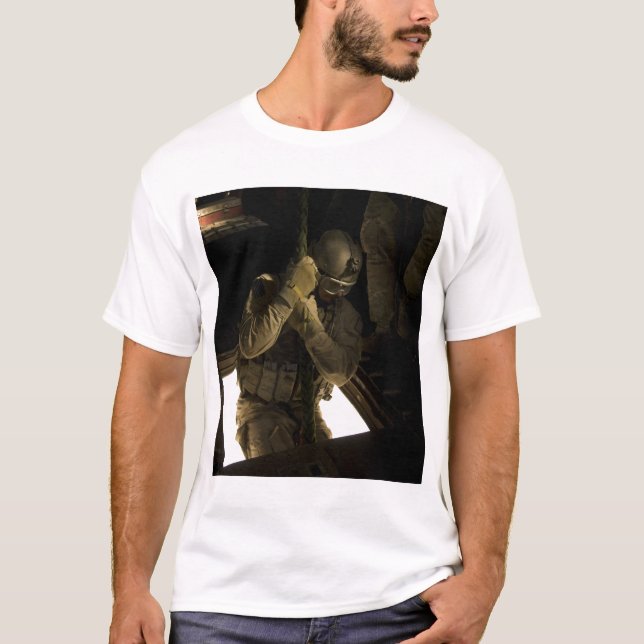 A US Air Force pararescueman begins his descent T-Shirt (Front)