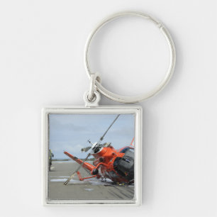A US Coast Guard MH-65 Dolphin helicopter crash Key Ring