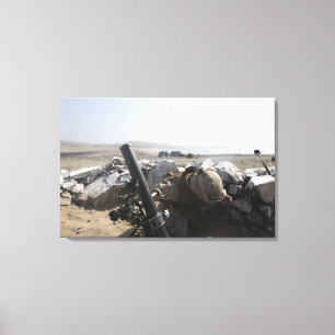 A US Marine fires a mortar in Salinas, Peru Canvas Print