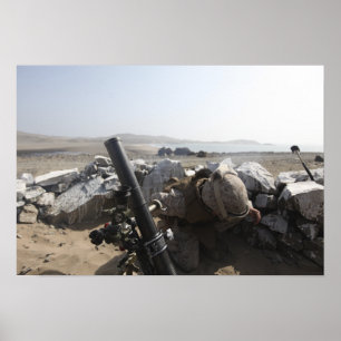 A US Marine fires a mortar in Salinas, Peru Poster