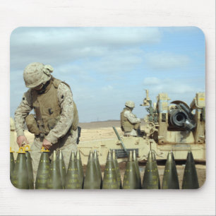 A US Marine prepares howitzer rounds to be fire Mouse Mat