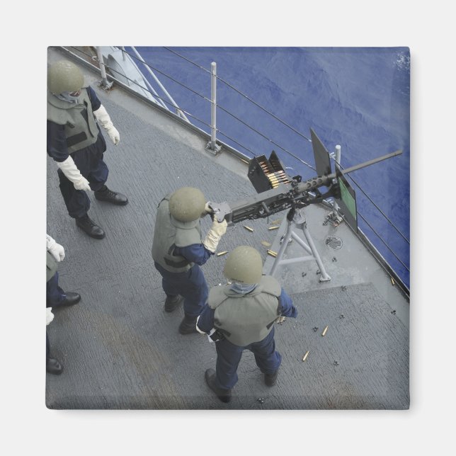 A US Sailor fires a 50-calibre M2HB Magnet (Front)