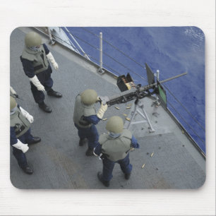 A US Sailor fires a 50-calibre M2HB Mouse Mat
