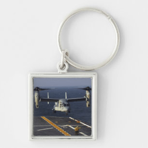 A V-22 Osprey aircraft prepares to land Key Ring