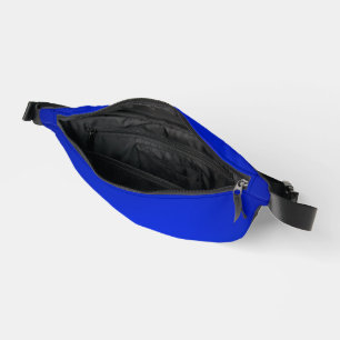 A vibrant blue waist pack with a black zipper 