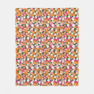A vibrant pattern of small, colourful flowers fleece blanket