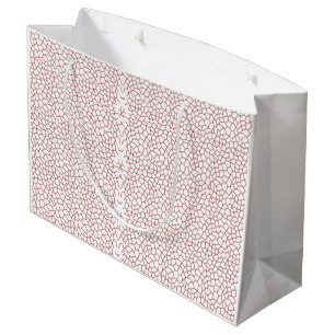 A vibrant rug featuring an intricate geometric mot large gift bag