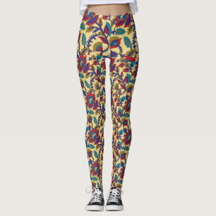A vibrant textile art piece featuring bold red, ye leggings