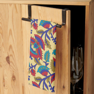 A vibrant textile art piece featuring bold red, ye tea towel