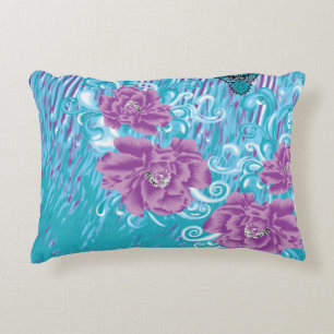 A vibrant textile design featuring purple and turq decorative cushion