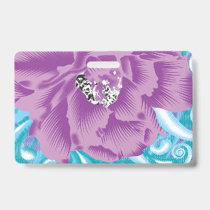 A vibrant textile design featuring purple and turq ID badge