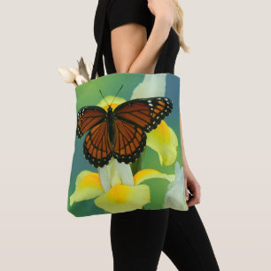 A Viceroy Butterfly on a Yellow Japanese Iris Tote Bag