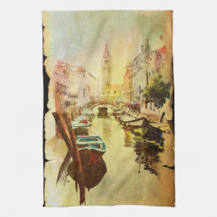 A View Of The Canal With Boats And Buildings Tea Towel