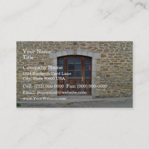 A vintage door and window  in stone wall business card