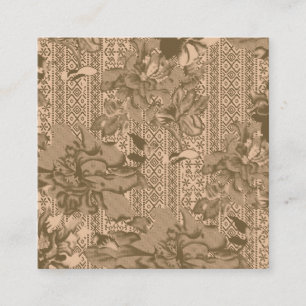 A vintage floral pattern with intricate brown desi referral card
