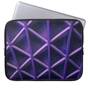A violet ceiling with a criss-cross pattern; a blu laptop sleeve