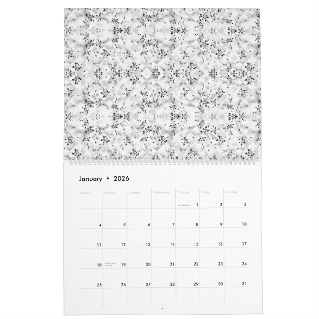 A visually striking white and black patterned wall calendar (Jan 2026)