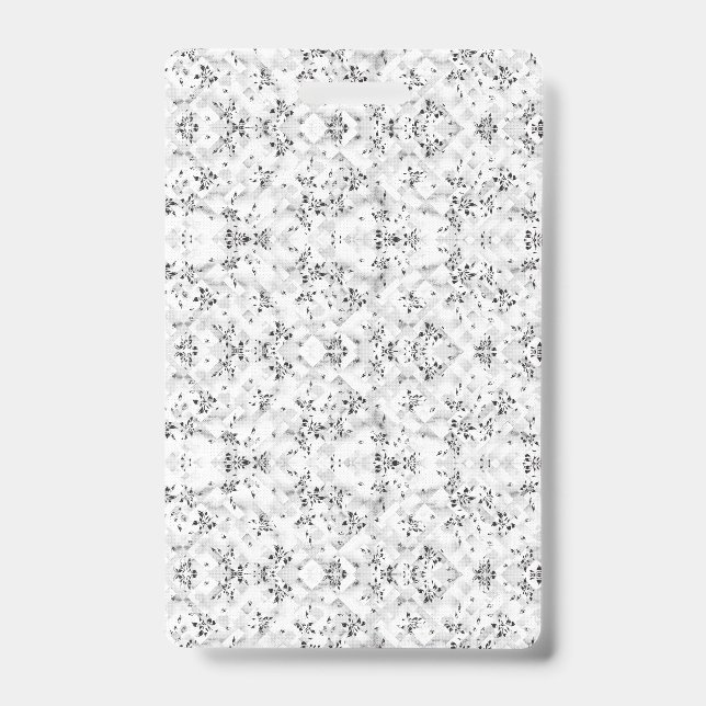 A visually striking white and black patterned wall ID badge (Front)