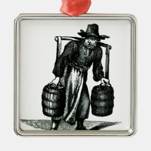 A Water Carrier Metal Tree Decoration