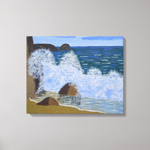 A wave breaking on the beach canvas print