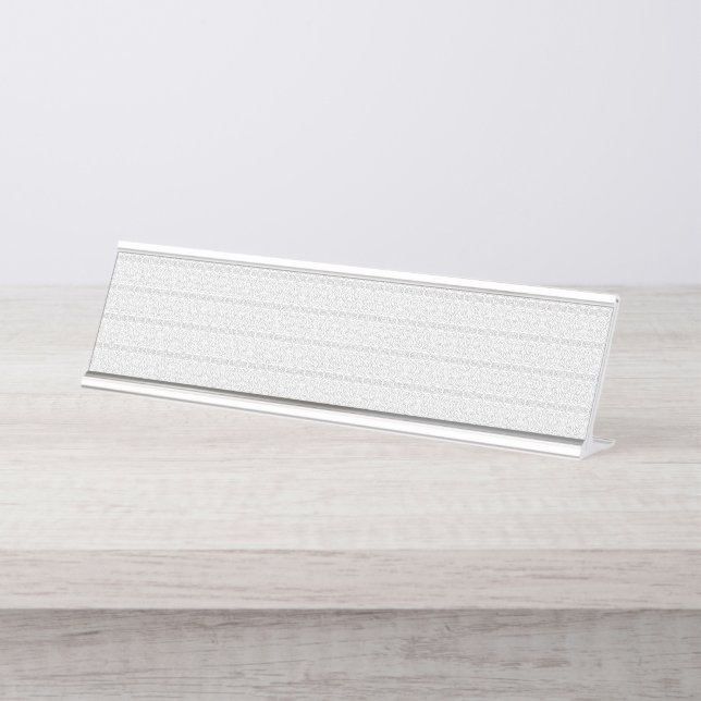 A white and grey geometric pattern fills the image desk name plate (Front)