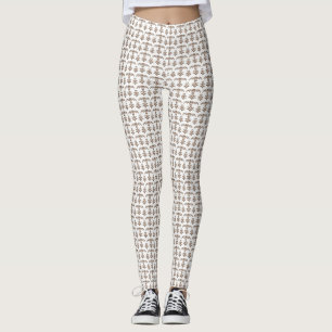 a white background with a brown pattern on it leggings