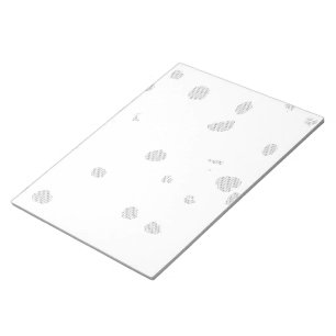 a white background with a lot of small dots notepad