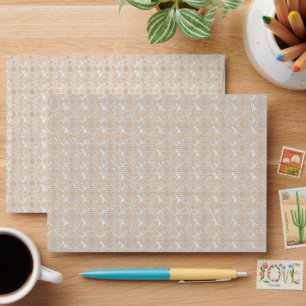 a white background with brown dots on it envelope