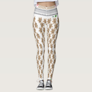 a white background with brown flowers on it leggings