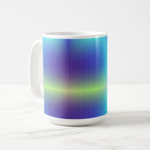 A white ceramic mug features a colourful gradient