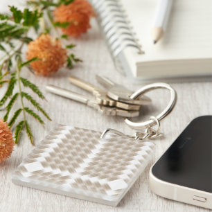A white, equilateral triangle centred on a plain  key ring