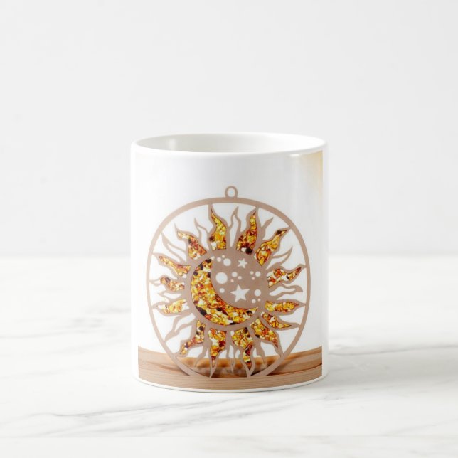 a white mug with an image of sun and moon (Center)