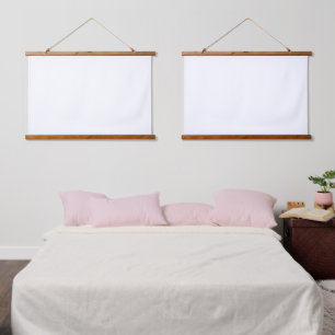 A white square enclosed by a distinct black border hanging tapestry