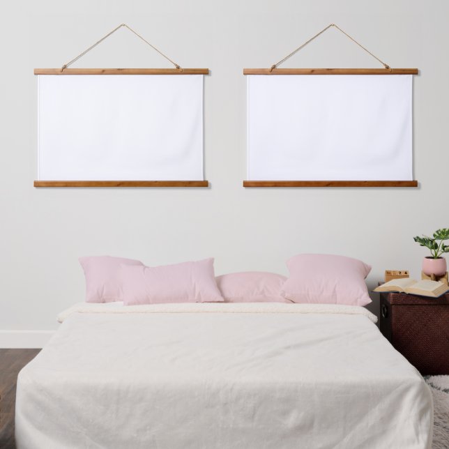A white square enclosed by a distinct black border hanging tapestry (Bedroom)
