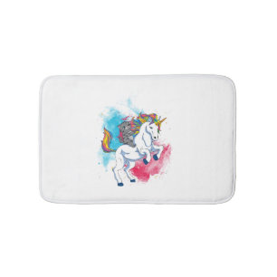 A white unicorn with rainbow tail which is ridden bath mat