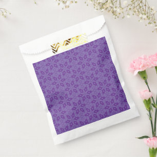 A white wrapping paper with a repeating pattern of favour bags
