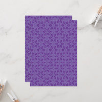 A white wrapping paper with a repeating pattern of
