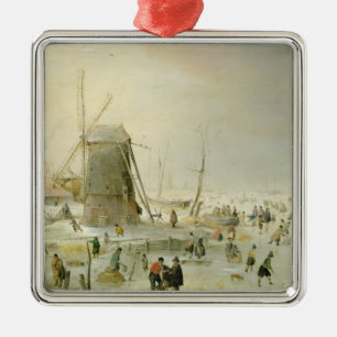A winter scene with skaters by a windmill metal tree decoration