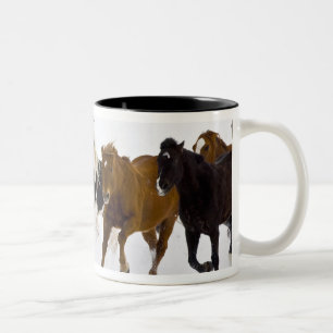 A winter scenic of running horses Two-Tone coffee mug