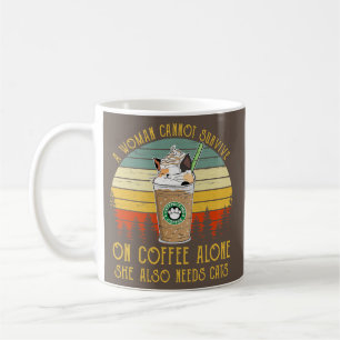 A woman cannot survive on coffee alone she also coffee mug