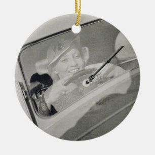 A woman driving, c.1930s (photogravure) ceramic tree decoration