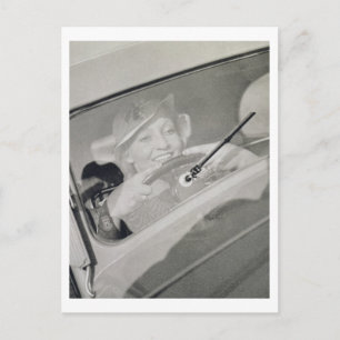 A woman driving, c.1930s (photogravure) postcard
